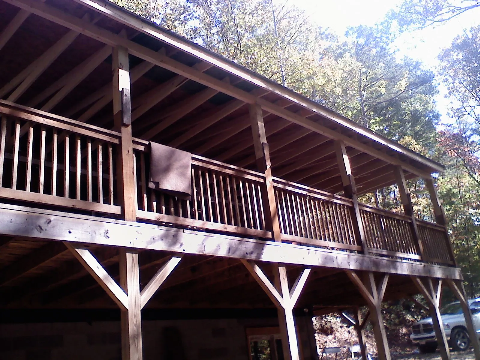 Timber framing under a new elevated porch and deck — Roof Leak Repair in Spring Green by Roofing Brothers